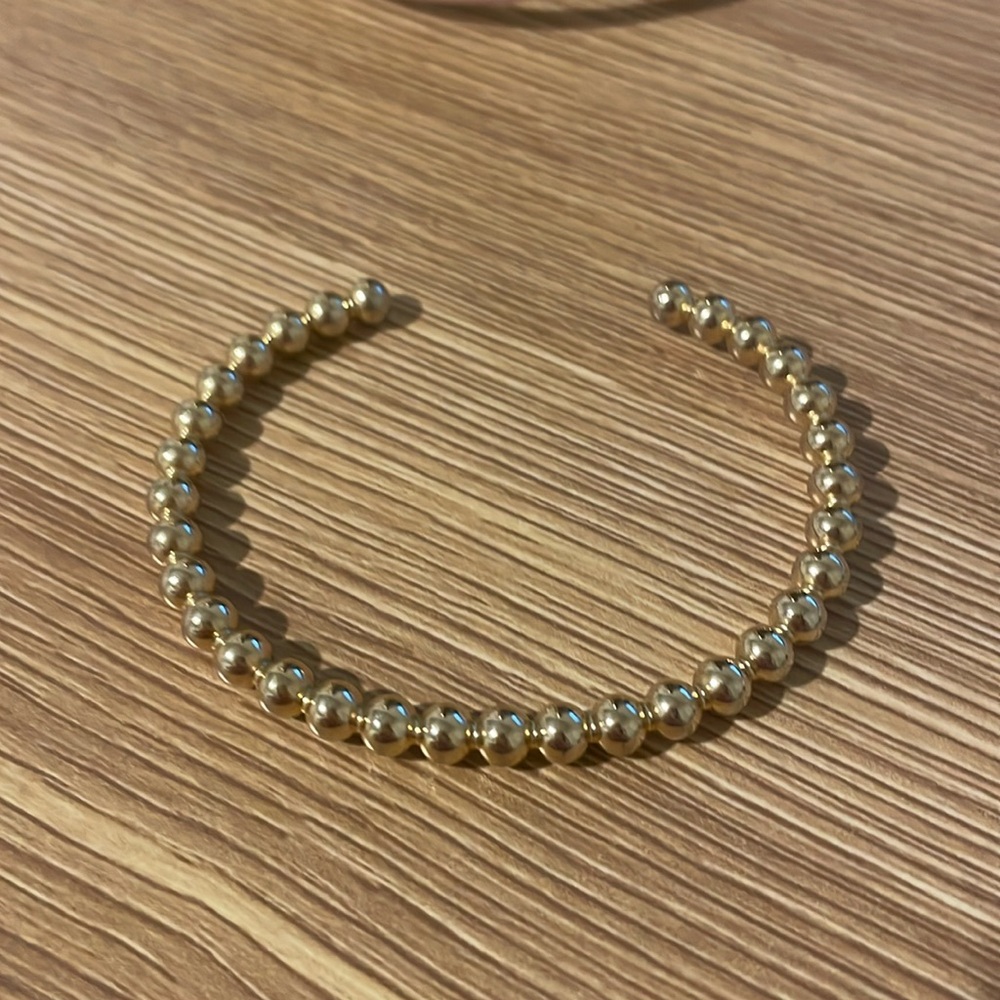 Gold cuff bracelet